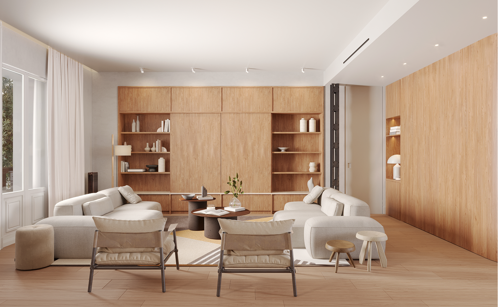 Salón comedor con grandes ventanales y acabados de alta calidad en pleno barrio de Salamanca.